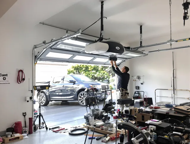 West Whittier-Los Nietos Garage Door Repair specialist installing smart garage door opener system in West Whittier-Los Nietos home