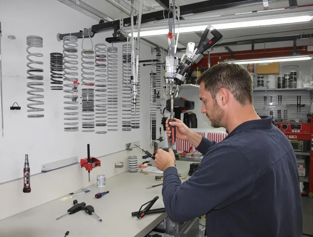 West Whittier-Los Nietos Garage Door Repair safety certified technician performing precision spring replacement in West Whittier-Los Nietos